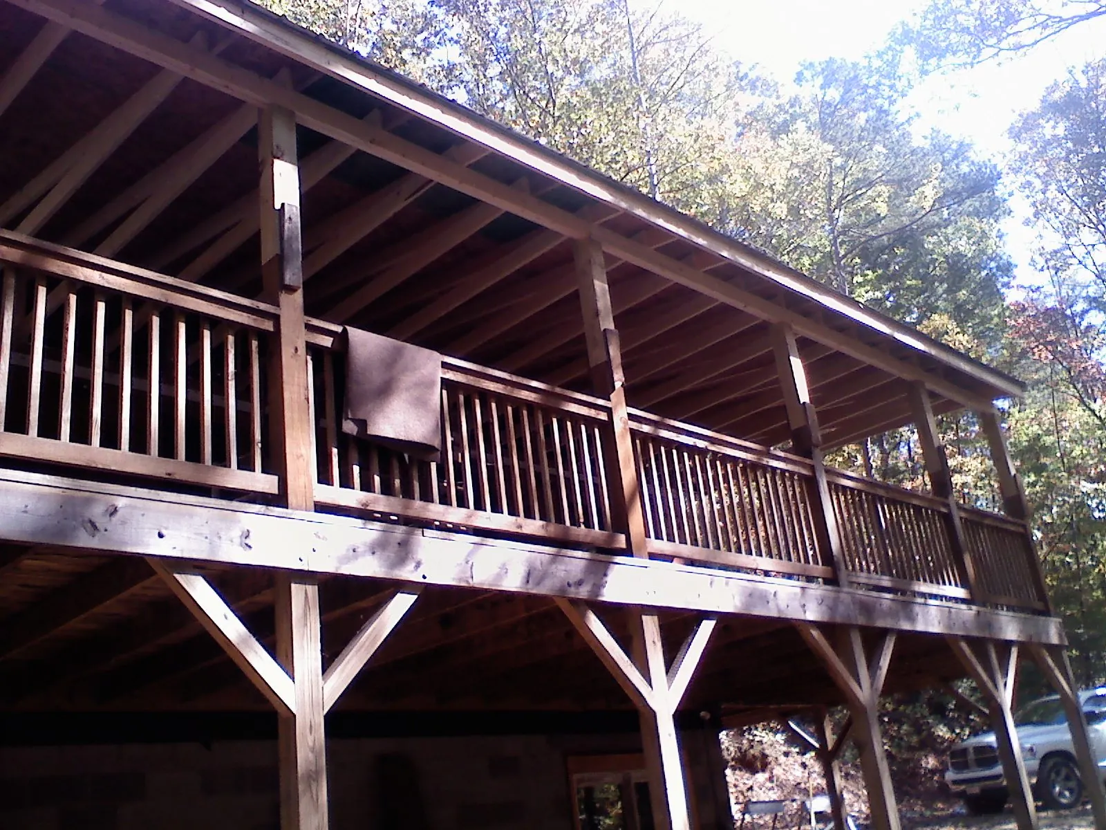 Timber framing under a new elevated porch and deck — Roof Leak Repair in Seward by Roofing Brothers